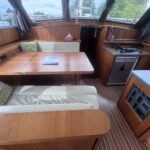 Vedette hollandaise Linssen Grand Sturdy 40.9 AC CALIMERO (2015) – carré et cuisine avec plaque gaz