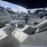 Vedette Fairline 36 Stella (1989) – cockpit arrière ombragé sous bimini