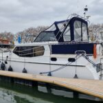 Vedette hollandaise Noblesse 38 ANATOLE (1998) – vue extérieure au ponton, taud fermé