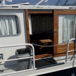 Vedette hollandaise Smelne 1140 Dreamflower (1985) – porte latérale et passavant tribord