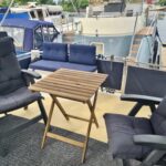 Vedette hollandaise Noblesse 38 ANATOLE (1998) – terrasse arrière avec fauteuils et table