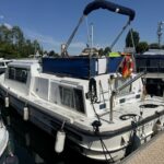 Vedette fluviale Connoisseur 1135 Ingrine (1986) – vue extérieure arrière avec taud