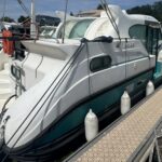 Vedette fluviale Nicols 1100 Lodève (1998) – vue trois-quarts arrière au ponton