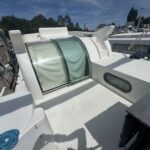 Vedette fluviale Nicols 1100 Lodève (1998) – capote vitrée coulissante du pont arrière