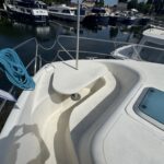 Vedette fluviale Nicols 1100 Lodève (1998) – plage avant avec table amovible