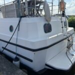 Vedette hollandaise Vetus 1200 Damier (1992) – arrière du bateau avec plateforme et échelle de bain