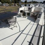 Vedette hollandaise Vetus 1200 Damier (1992) – terrasse du pont supérieur et poste de pilotage extérieur