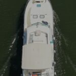 Vedette fluviale Nicols 1100 Lodève (1998) – vue aérienne verticale en navigation