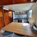 Chantier Naval de Thuin Péniche 39,10 m — coin repas